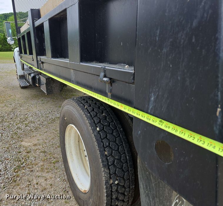 image for item DP6402 2011 Ford F750 Super Duty Ext. Cab dump flatbed truck