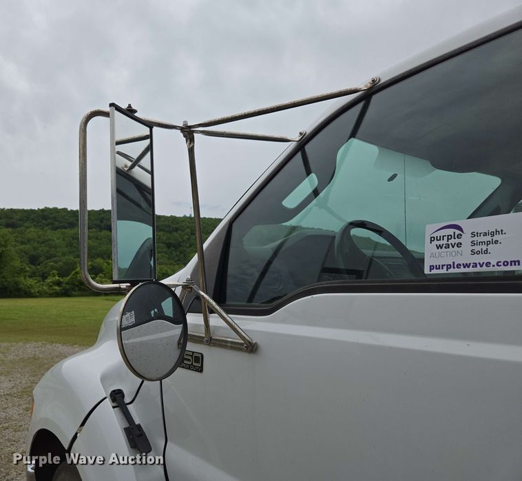 image for item DP6402 2011 Ford F750 Super Duty Ext. Cab dump flatbed truck