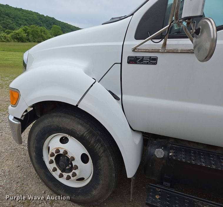 image for item DP6402 2011 Ford F750 Super Duty Ext. Cab dump flatbed truck
