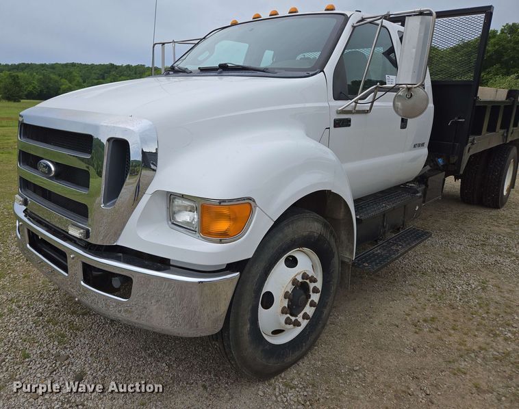 image for item DP6402 2011 Ford F750 Super Duty Ext. Cab dump flatbed truck