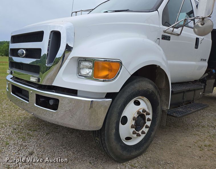 image for item DP6402 2011 Ford F750 Super Duty Ext. Cab dump flatbed truck