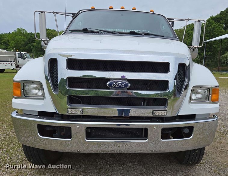 image for item DP6402 2011 Ford F750 Super Duty Ext. Cab dump flatbed truck