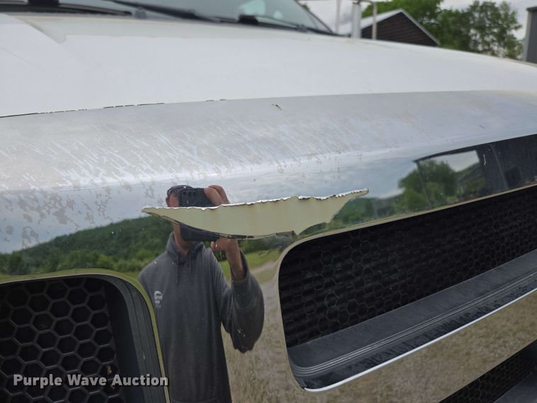 image for item DP6402 2011 Ford F750 Super Duty Ext. Cab dump flatbed truck