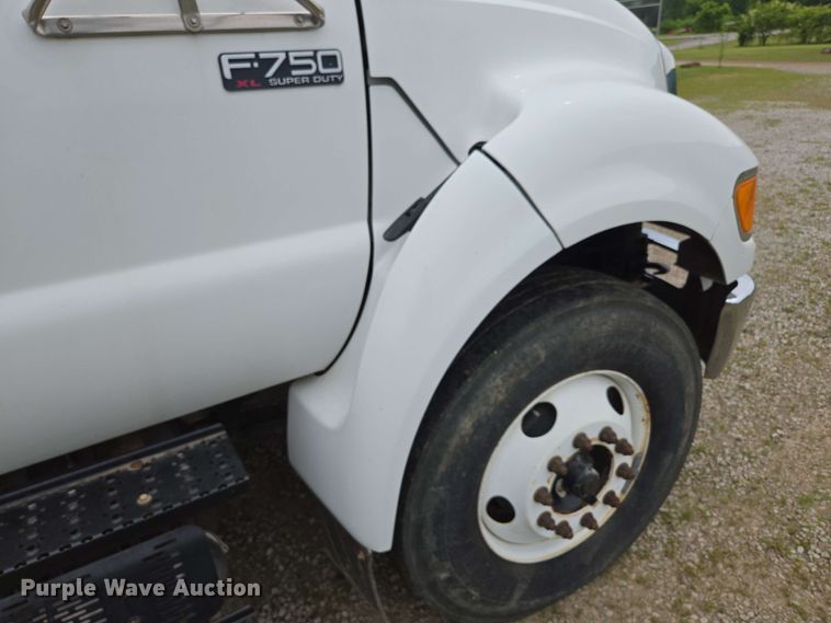 image for item DP6402 2011 Ford F750 Super Duty Ext. Cab dump flatbed truck