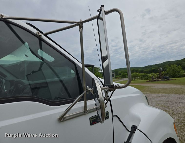 image for item DP6402 2011 Ford F750 Super Duty Ext. Cab dump flatbed truck