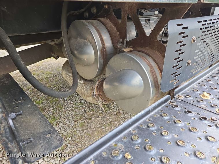 image for item DP6402 2011 Ford F750 Super Duty Ext. Cab dump flatbed truck