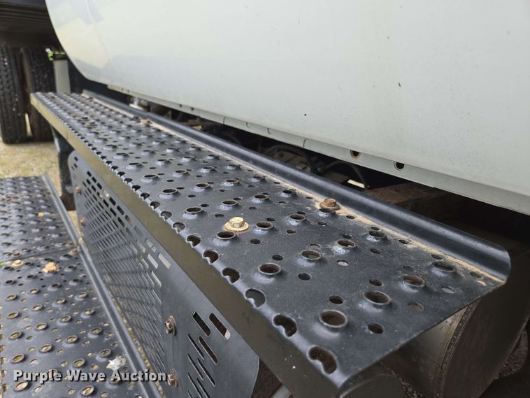 image for item DP6402 2011 Ford F750 Super Duty Ext. Cab dump flatbed truck