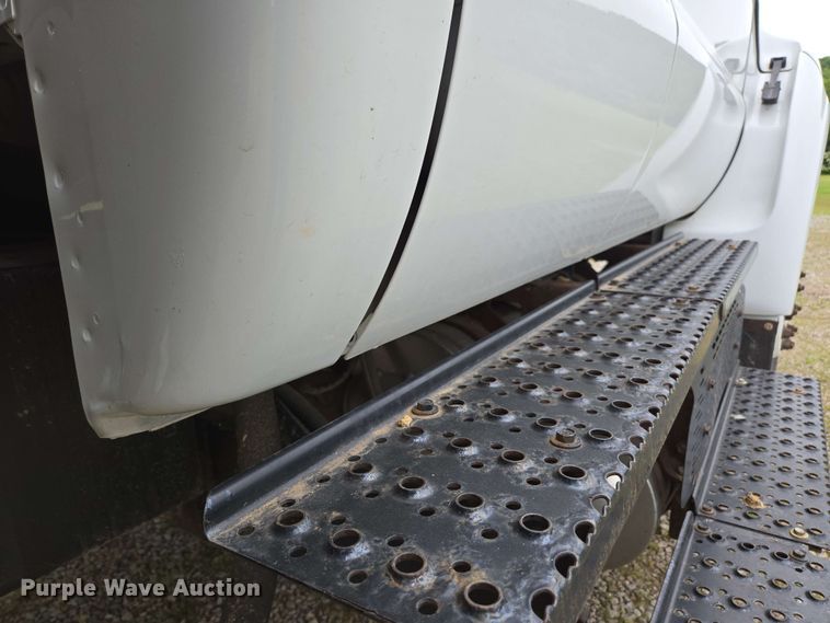 image for item DP6402 2011 Ford F750 Super Duty Ext. Cab dump flatbed truck