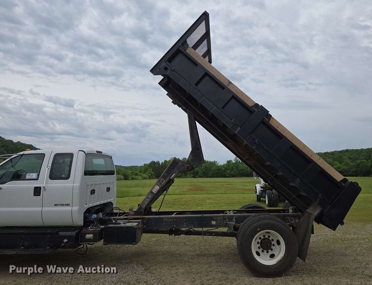 image for item DP6402 2011 Ford F750 Super Duty Ext. Cab dump flatbed truck