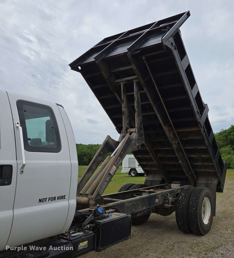 image for item DP6402 2011 Ford F750 Super Duty Ext. Cab dump flatbed truck
