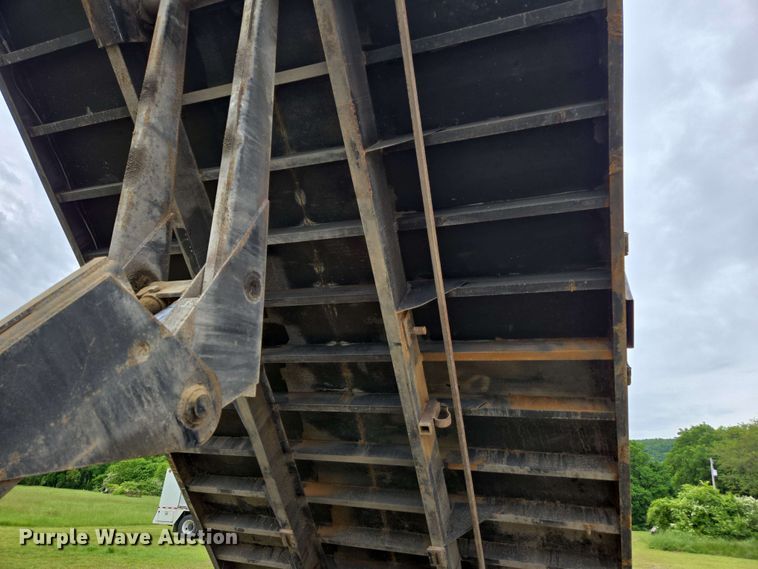 image for item DP6402 2011 Ford F750 Super Duty Ext. Cab dump flatbed truck