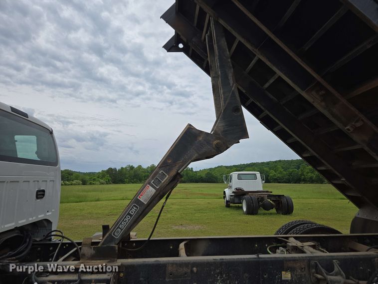 image for item DP6402 2011 Ford F750 Super Duty Ext. Cab dump flatbed truck