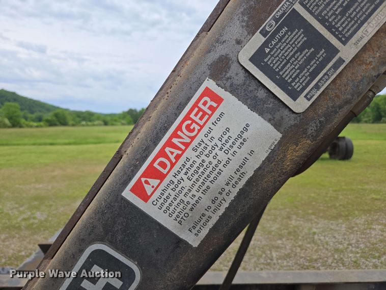 image for item DP6402 2011 Ford F750 Super Duty Ext. Cab dump flatbed truck