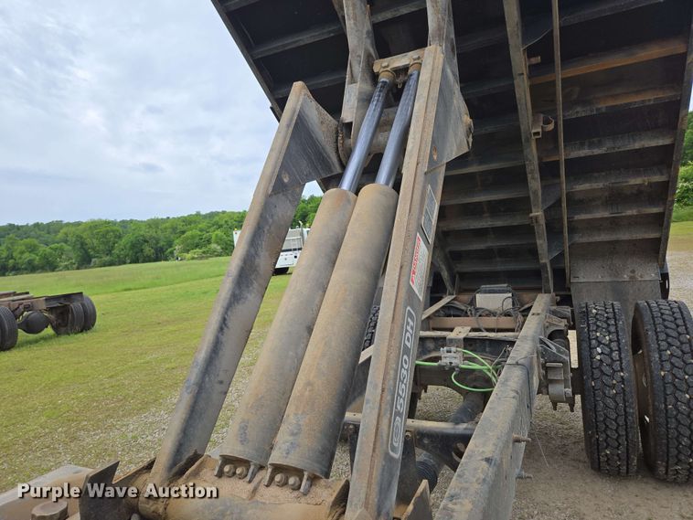 image for item DP6402 2011 Ford F750 Super Duty Ext. Cab dump flatbed truck