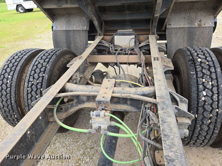 image for item DP6402 2011 Ford F750 Super Duty Ext. Cab dump flatbed truck