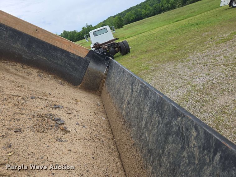 image for item DP6402 2011 Ford F750 Super Duty Ext. Cab dump flatbed truck