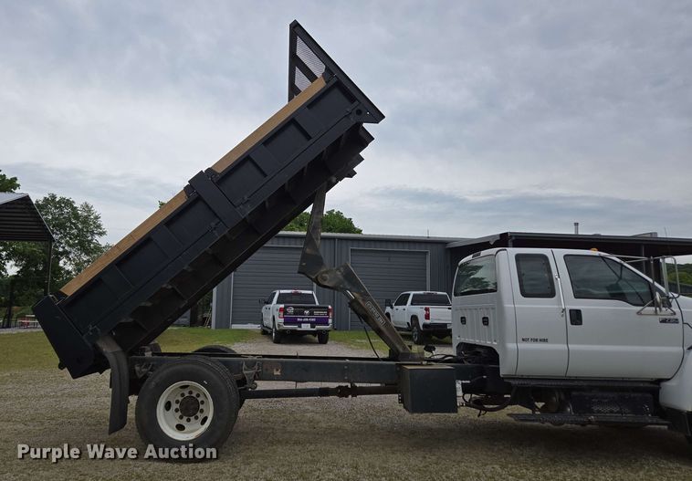 image for item DP6402 2011 Ford F750 Super Duty Ext. Cab dump flatbed truck