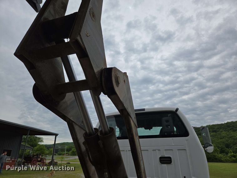 image for item DP6402 2011 Ford F750 Super Duty Ext. Cab dump flatbed truck