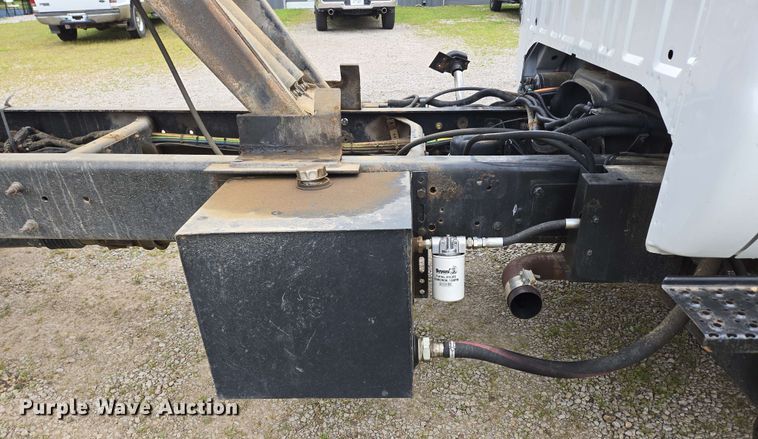 image for item DP6402 2011 Ford F750 Super Duty Ext. Cab dump flatbed truck