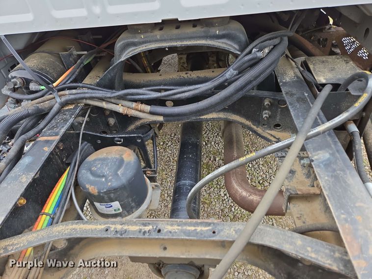 image for item DP6402 2011 Ford F750 Super Duty Ext. Cab dump flatbed truck