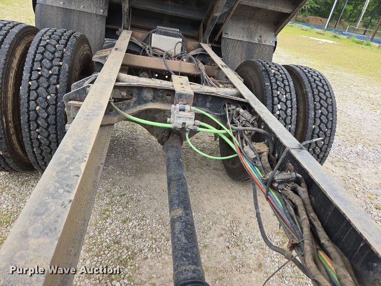 image for item DP6402 2011 Ford F750 Super Duty Ext. Cab dump flatbed truck