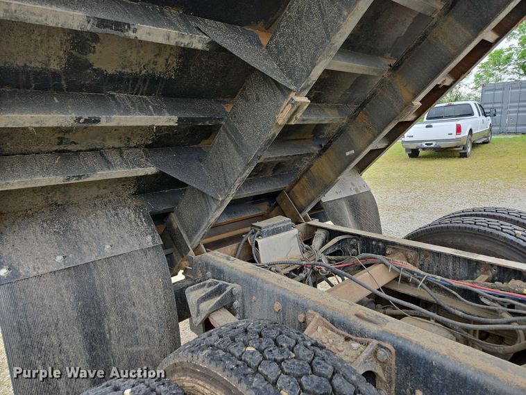 image for item DP6402 2011 Ford F750 Super Duty Ext. Cab dump flatbed truck