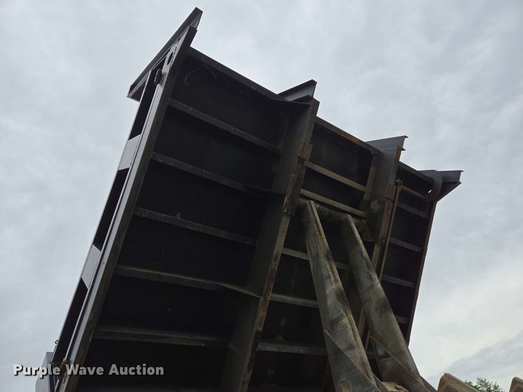 image for item DP6402 2011 Ford F750 Super Duty Ext. Cab dump flatbed truck