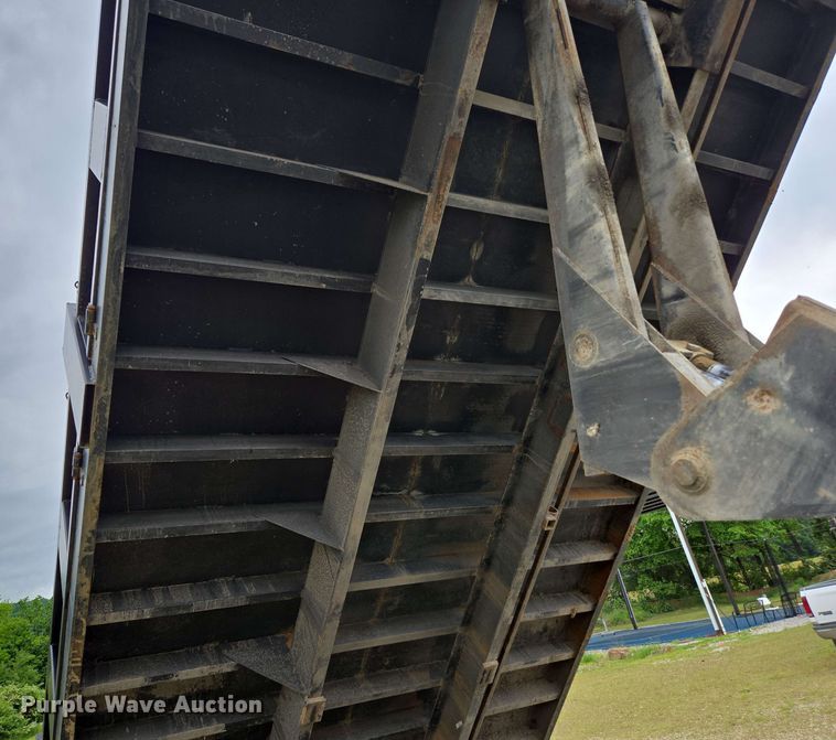 image for item DP6402 2011 Ford F750 Super Duty Ext. Cab dump flatbed truck