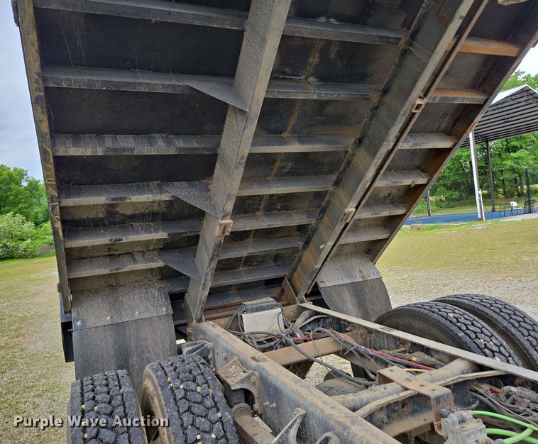 image for item DP6402 2011 Ford F750 Super Duty Ext. Cab dump flatbed truck