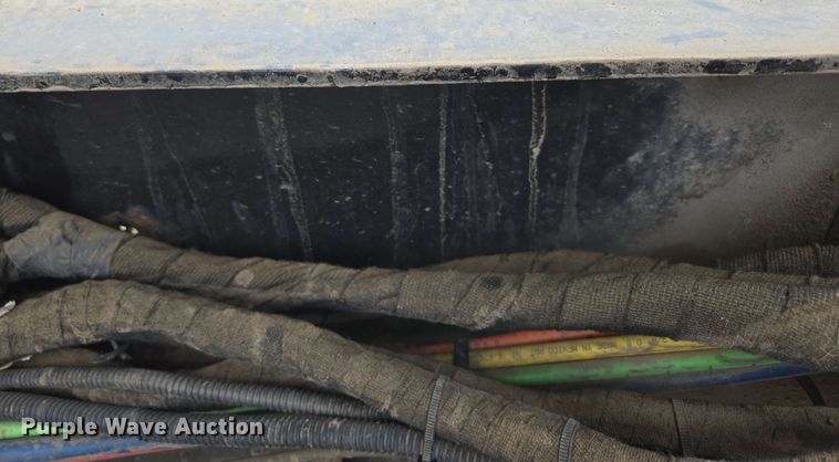 image for item DP6402 2011 Ford F750 Super Duty Ext. Cab dump flatbed truck