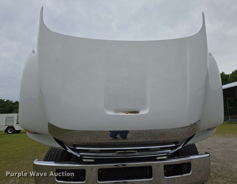 image for item DP6402 2011 Ford F750 Super Duty Ext. Cab dump flatbed truck