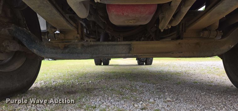 image for item DP6402 2011 Ford F750 Super Duty Ext. Cab dump flatbed truck