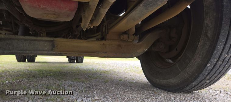 image for item DP6402 2011 Ford F750 Super Duty Ext. Cab dump flatbed truck