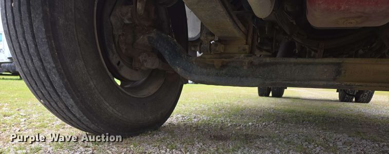 image for item DP6402 2011 Ford F750 Super Duty Ext. Cab dump flatbed truck