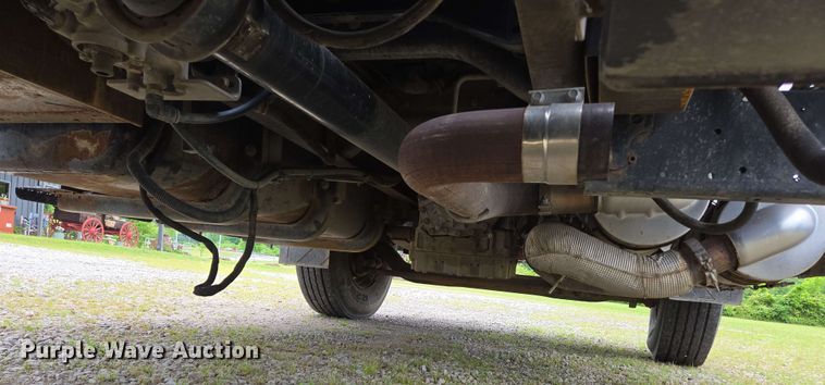 image for item DP6402 2011 Ford F750 Super Duty Ext. Cab dump flatbed truck