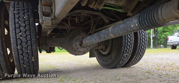 image for item DP6402 2011 Ford F750 Super Duty Ext. Cab dump flatbed truck