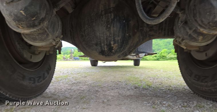 image for item DP6402 2011 Ford F750 Super Duty Ext. Cab dump flatbed truck