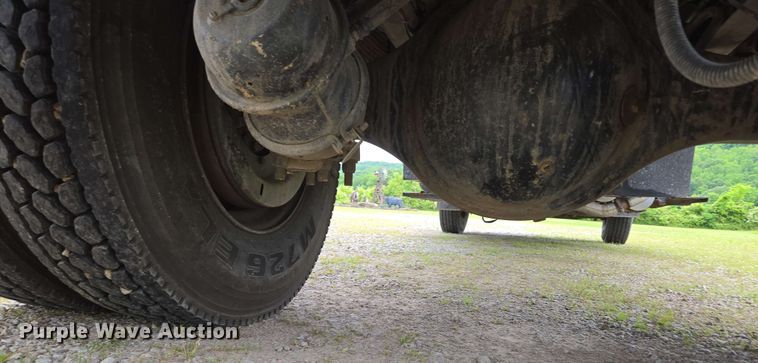 image for item DP6402 2011 Ford F750 Super Duty Ext. Cab dump flatbed truck