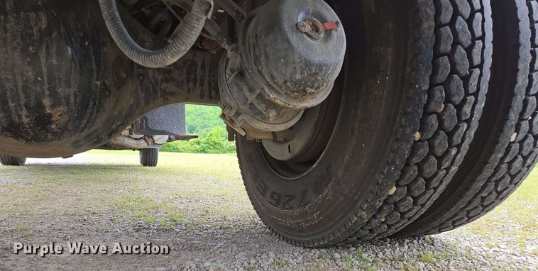 image for item DP6402 2011 Ford F750 Super Duty Ext. Cab dump flatbed truck