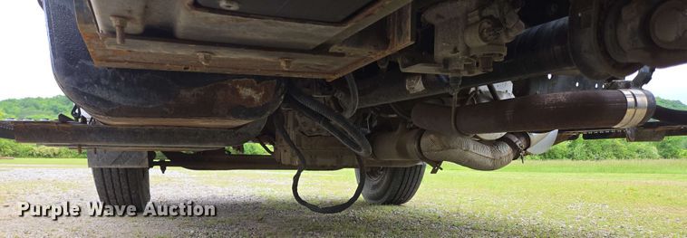 image for item DP6402 2011 Ford F750 Super Duty Ext. Cab dump flatbed truck