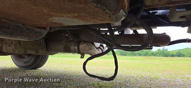 image for item DP6402 2011 Ford F750 Super Duty Ext. Cab dump flatbed truck