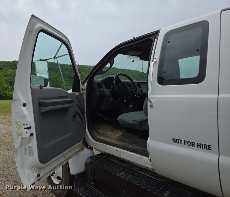 image for item DP6402 2011 Ford F750 Super Duty Ext. Cab dump flatbed truck