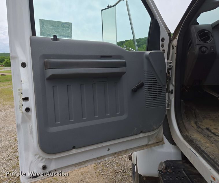 image for item DP6402 2011 Ford F750 Super Duty Ext. Cab dump flatbed truck