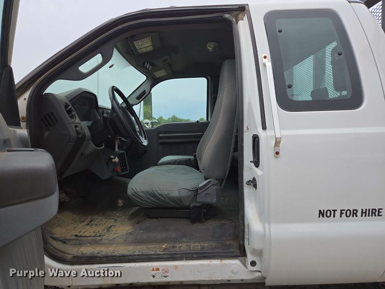 image for item DP6402 2011 Ford F750 Super Duty Ext. Cab dump flatbed truck