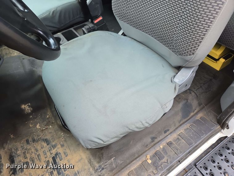 image for item DP6402 2011 Ford F750 Super Duty Ext. Cab dump flatbed truck