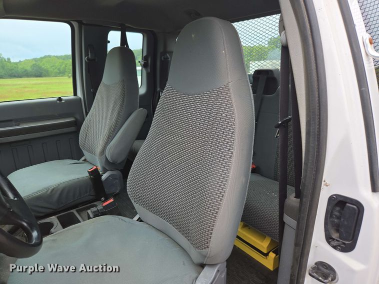 image for item DP6402 2011 Ford F750 Super Duty Ext. Cab dump flatbed truck