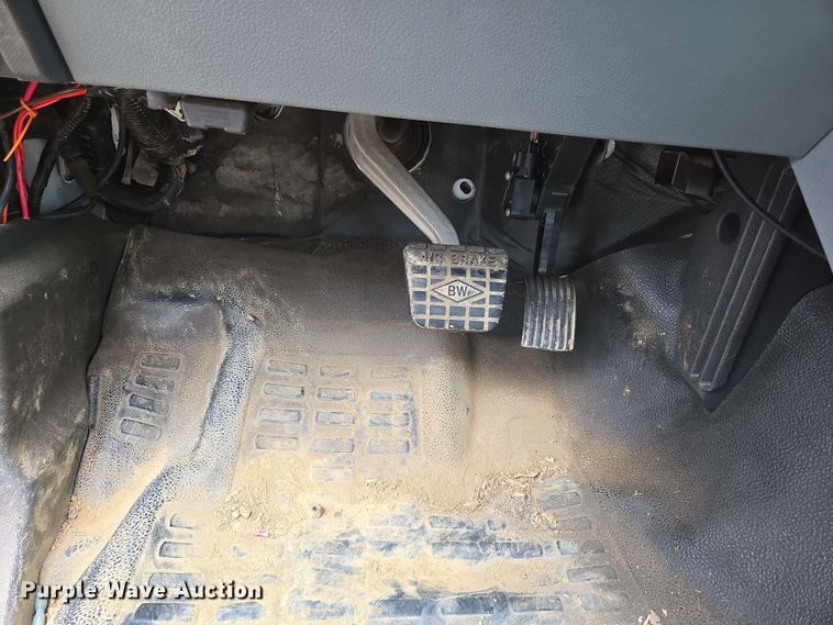 image for item DP6402 2011 Ford F750 Super Duty Ext. Cab dump flatbed truck