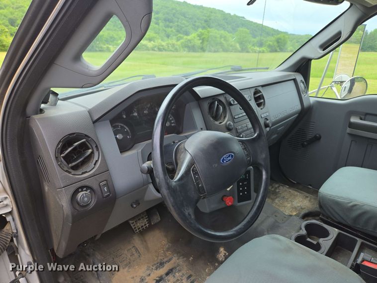 image for item DP6402 2011 Ford F750 Super Duty Ext. Cab dump flatbed truck