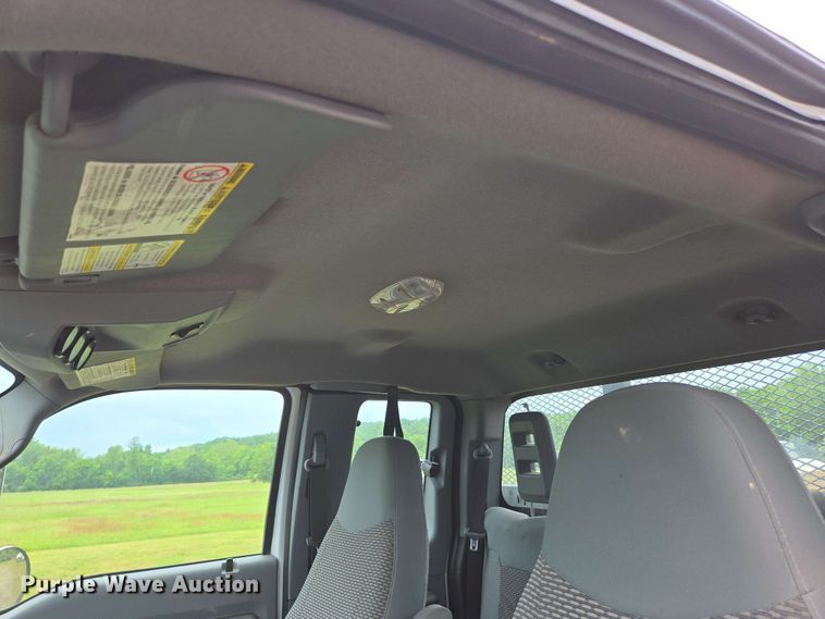 image for item DP6402 2011 Ford F750 Super Duty Ext. Cab dump flatbed truck