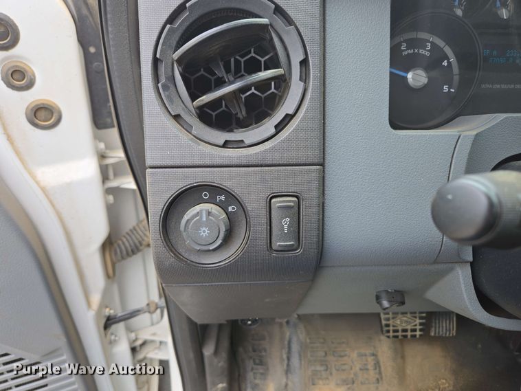 image for item DP6402 2011 Ford F750 Super Duty Ext. Cab dump flatbed truck